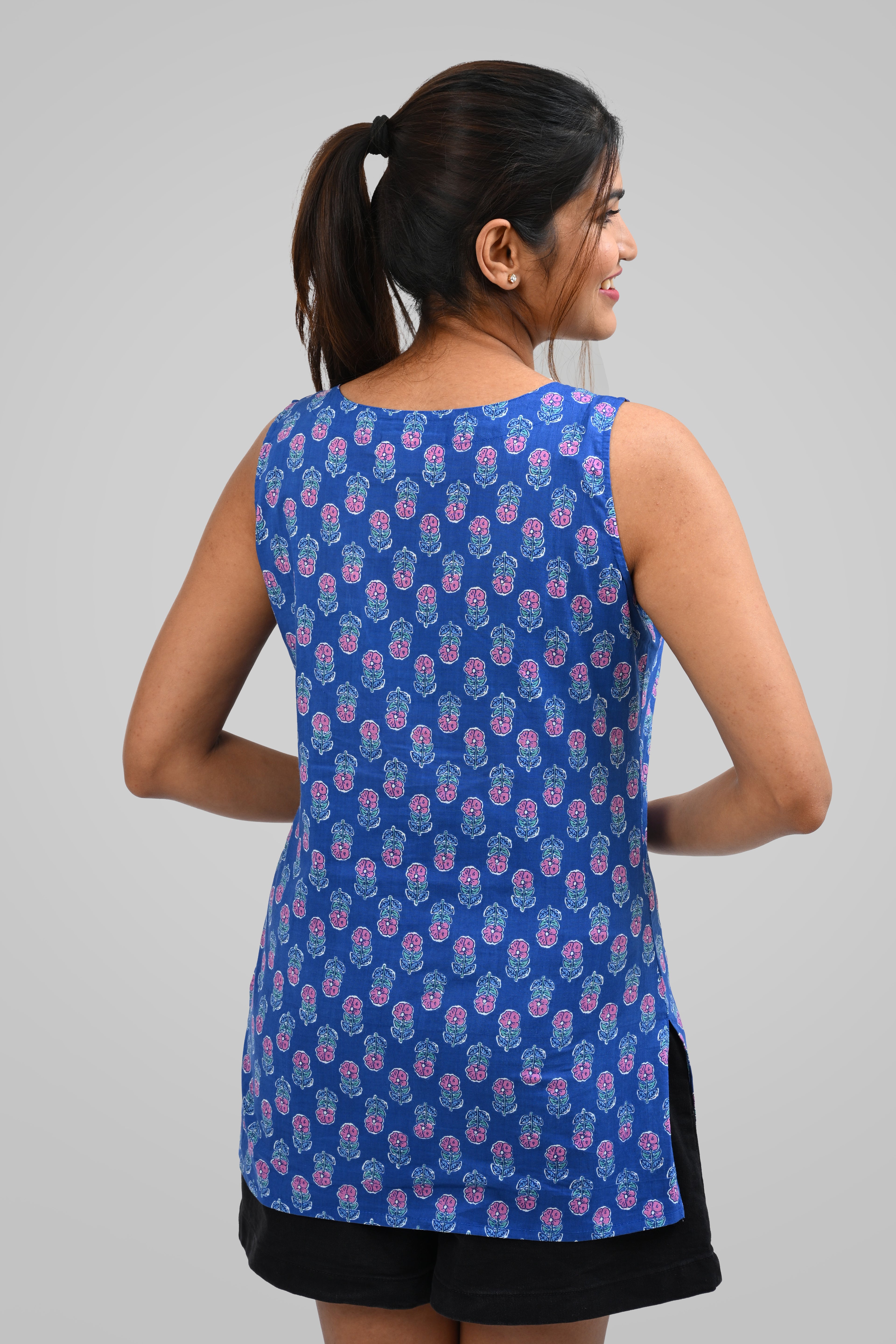 Fun Blue Cotton Printed Sleeveless Kurti