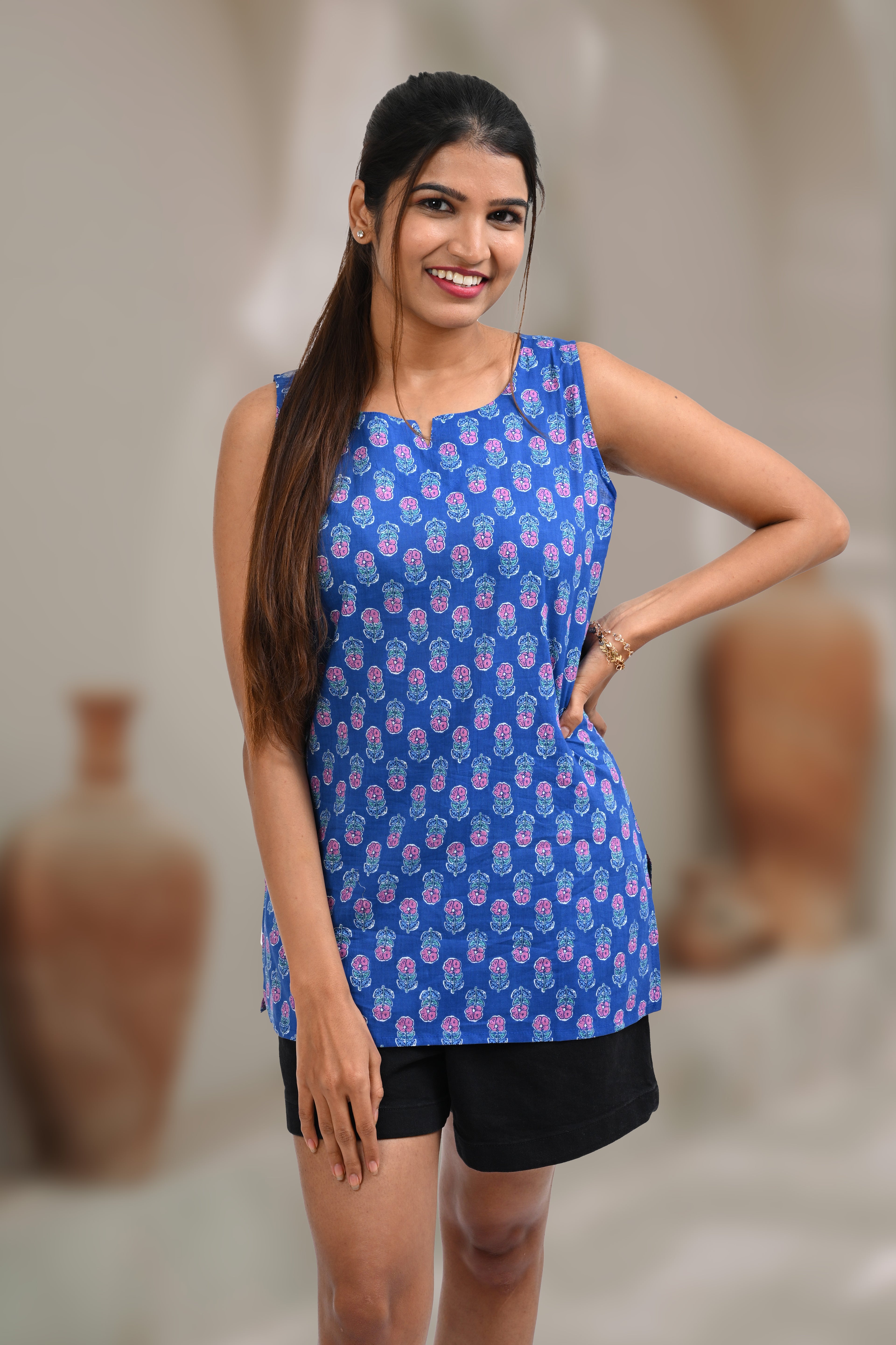 Fun Blue Cotton Printed Sleeveless Kurti