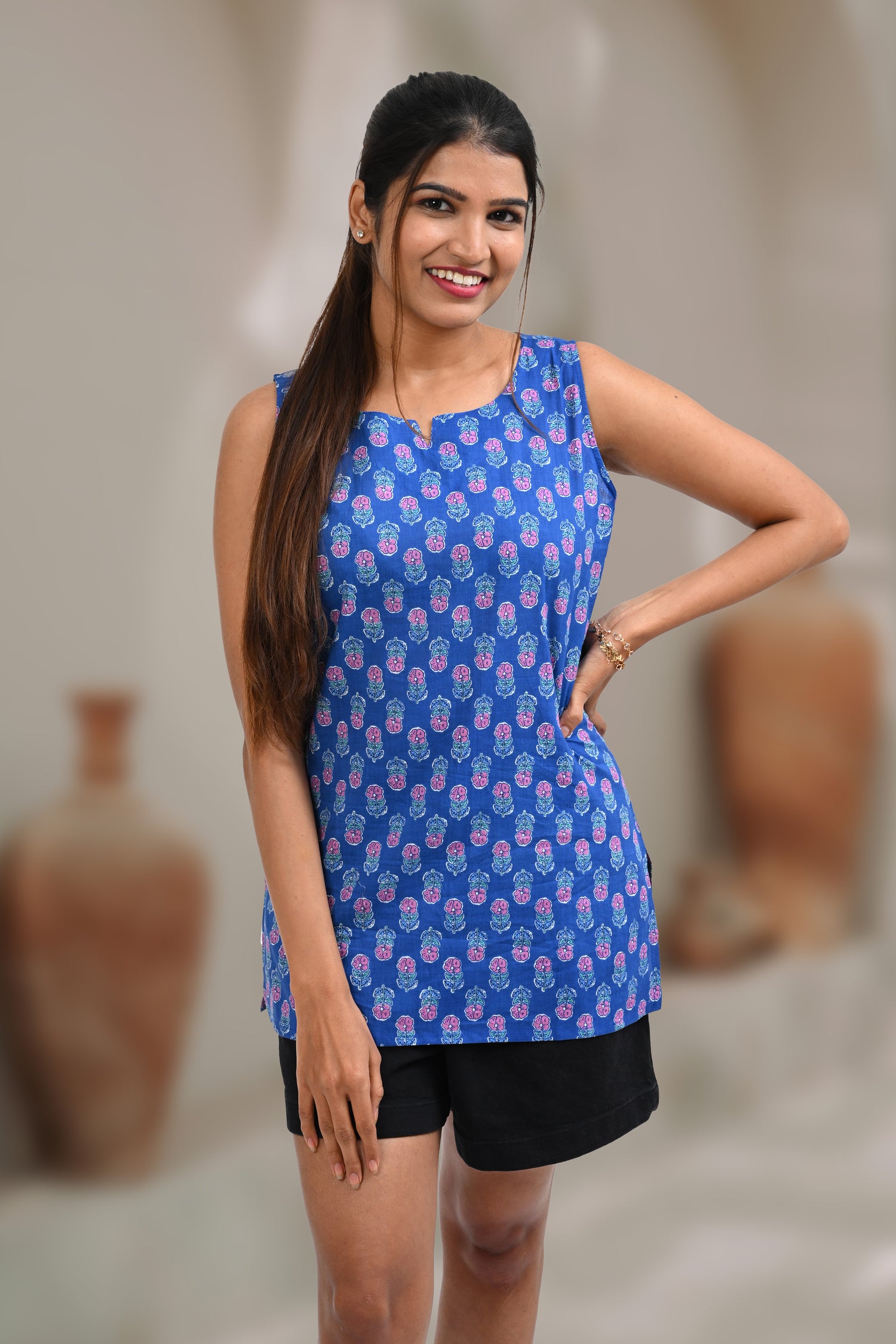 Fun Blue Cotton Printed Sleeveless Kurti